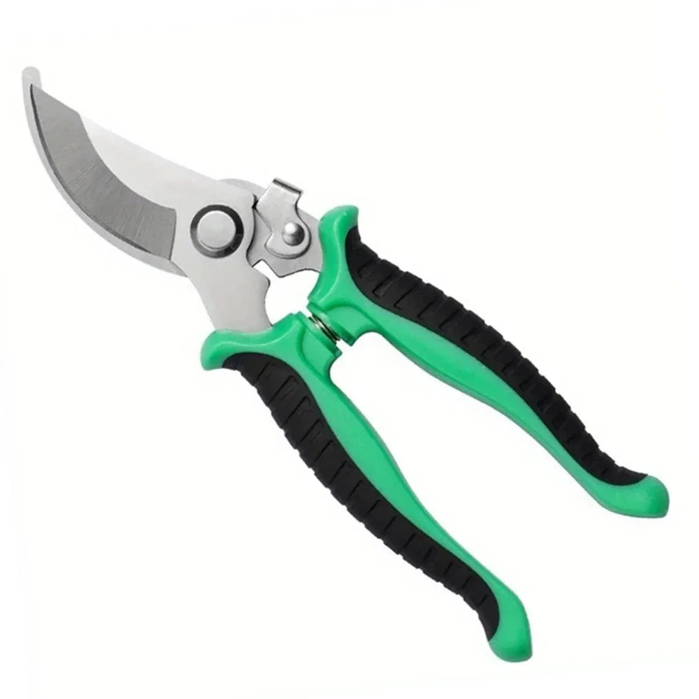 green and black handle shears garden laying diagonally on white background